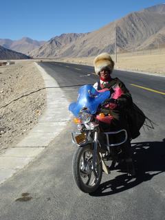 27_TibetanMotorcyclist_320.JPG