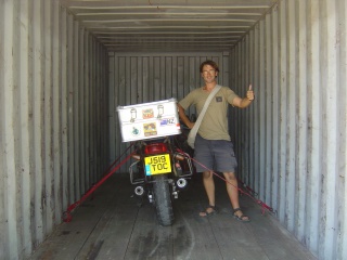 bike strapped down in container