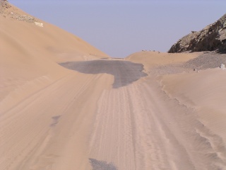 dunes encroaching on the road