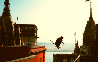 A Varanasi leap with a baby clinging on