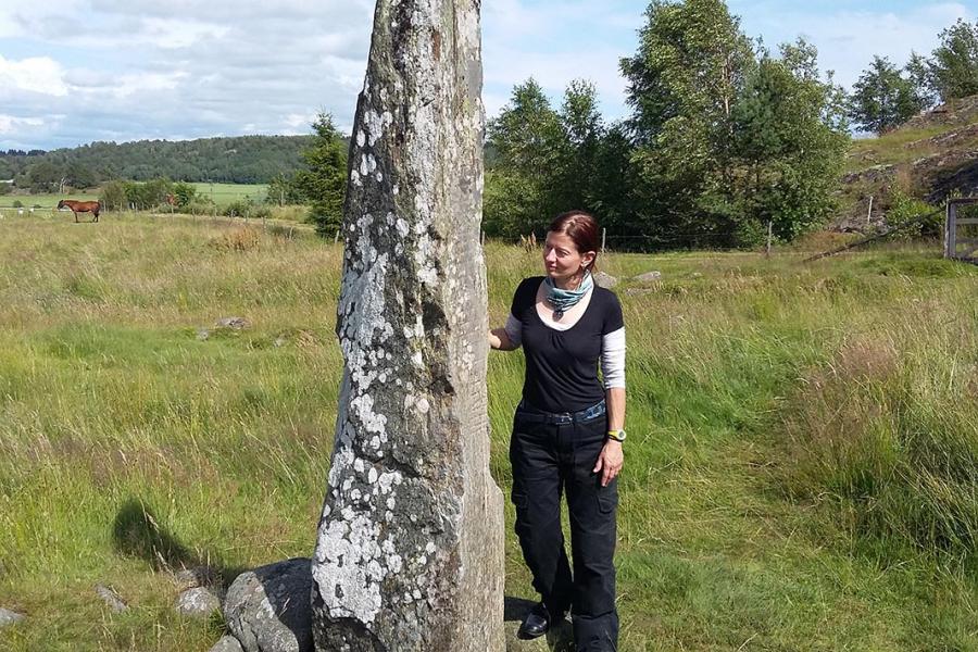 Imogen with stone at Ättehögskulle