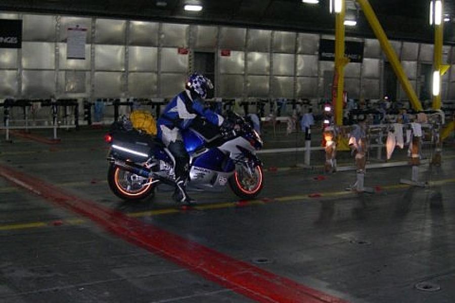 The first bikes roll onto the empty cargo deck