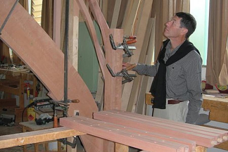 Mike inspects a staircase under construction