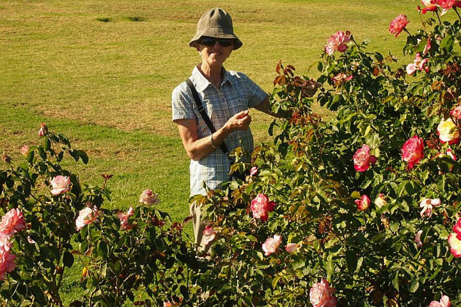 Jo smelling the roses in yet another town