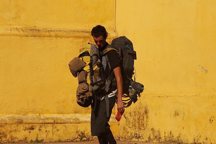 This backpacker has more gear that all of Team Elephant