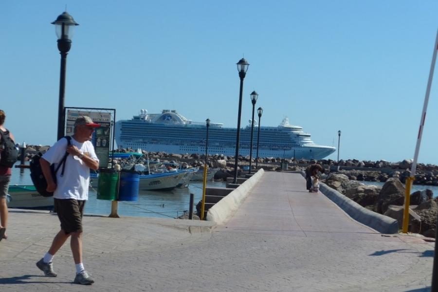 A cruise ship arrives at Loreto as we depart