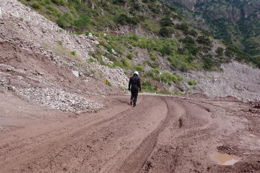 Mike walks a section of road to test the grip