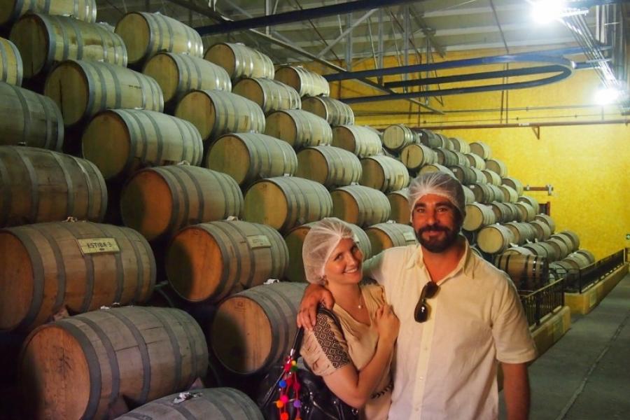 Andrea and Ernesto show off their hats