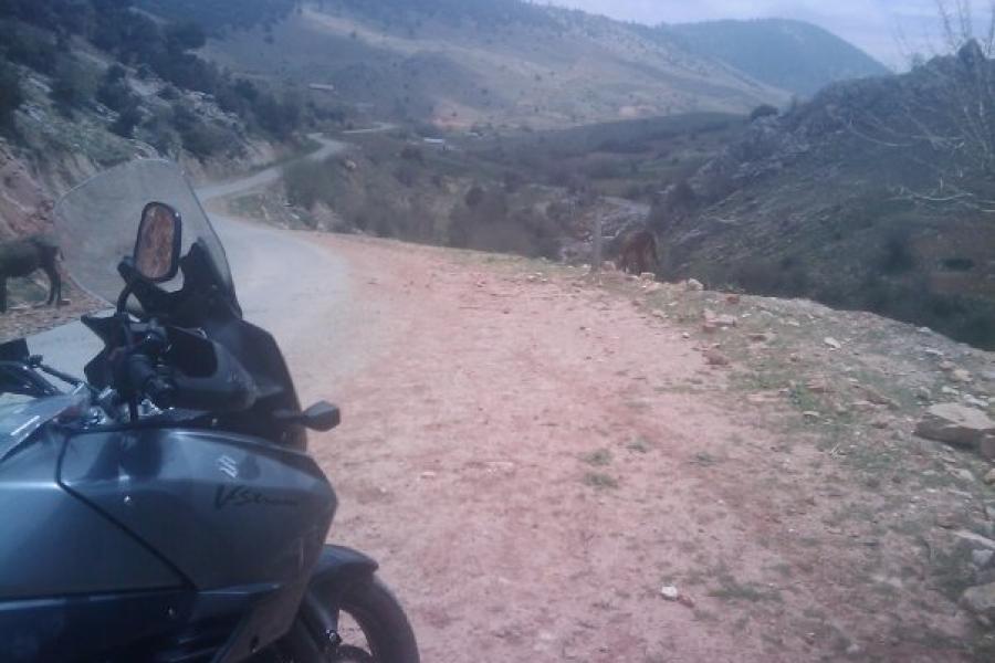 The VStrom looking ahead down the gravel track.