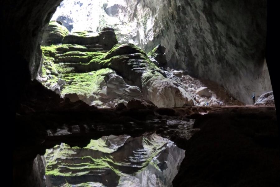 Reflective pool in Son Doong cave