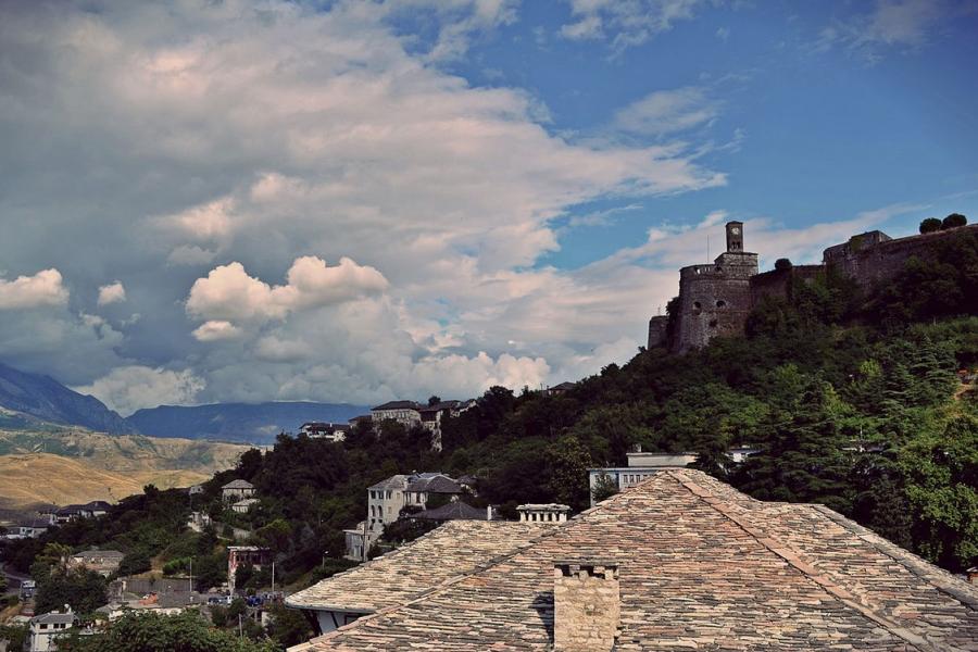 Beautiful blue sky and clouds above the Fortress of Gjirokastra, Albania