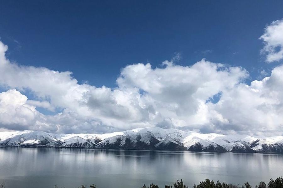 Blue sky, white clouds and mountains at Lake Sevan, Armenia