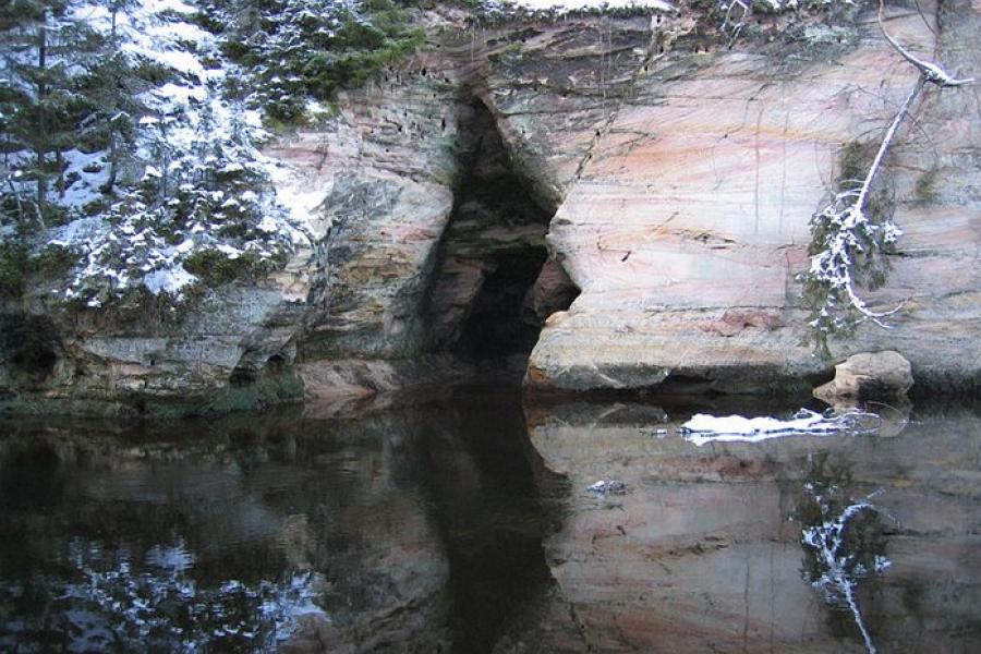 Sandstone cave by a lake, Taevaskoja, Estonia