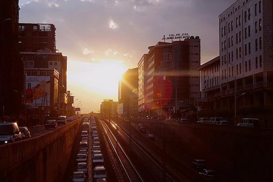 Sunset over busy city traffic, Addis Ababa, Ethiopia