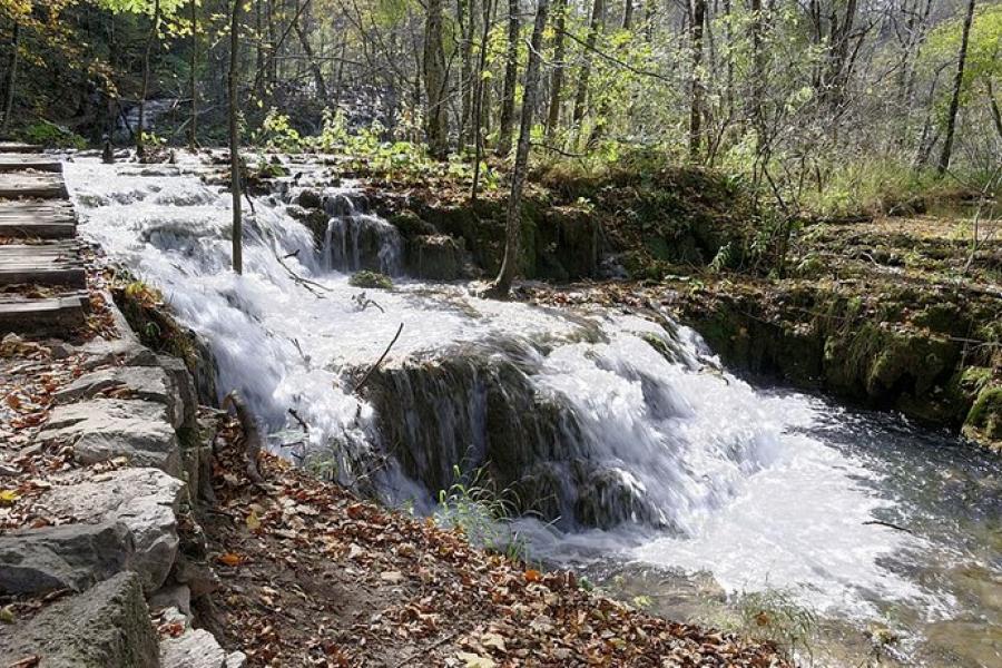 Path beside a water chute, Plitvice Lakes NP, Croatia