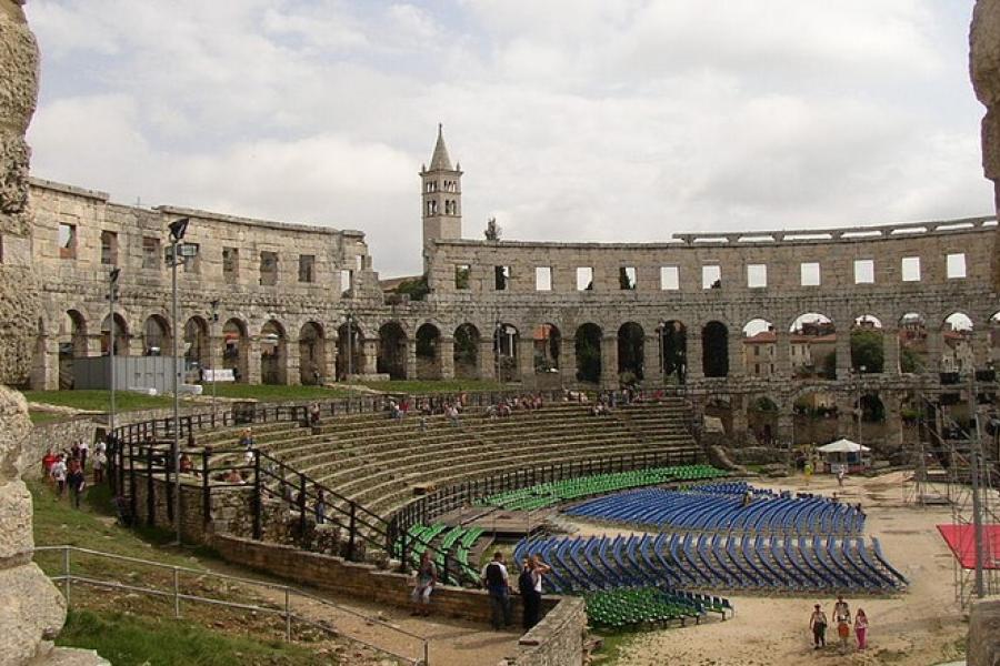 Preparing seating area for an event, Pula Amphitheatre