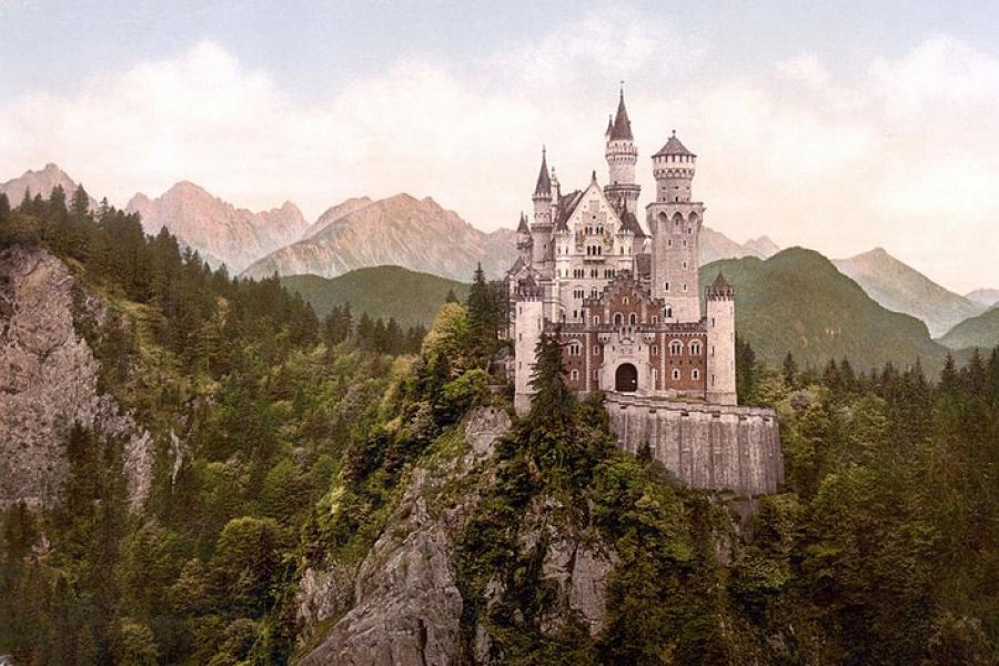 Neuschwanstein Castle with mountains in the background