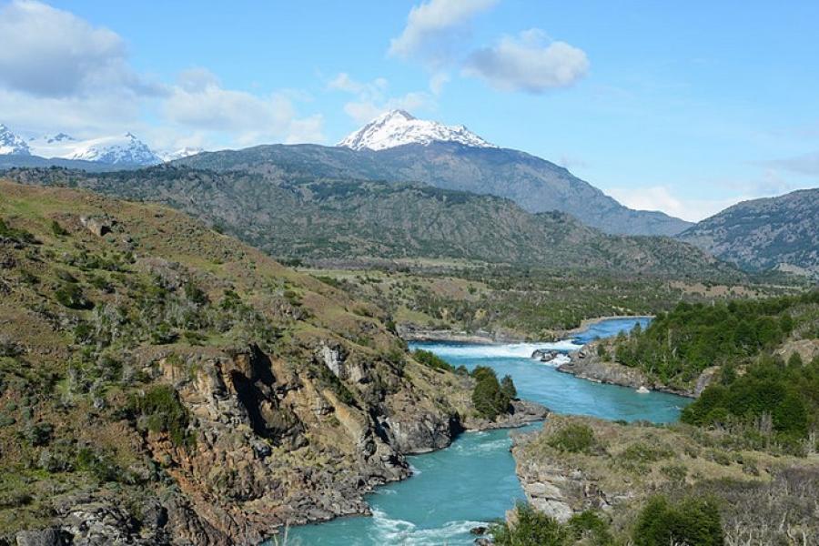 Carretera Austral, Chile - Azure blue river in mountainous terrain.