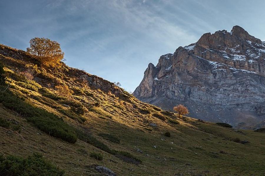 Pyrenees - Mountain and rocky hills vista with blue sky.